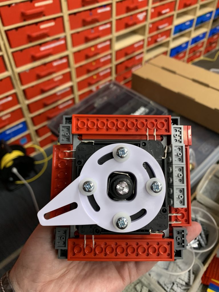 Photo showing the underside of the joystick wrapped in LEGO brick.