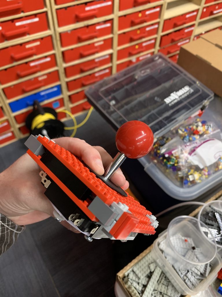 Photo showing the joystick wrapped with LEGO brick
