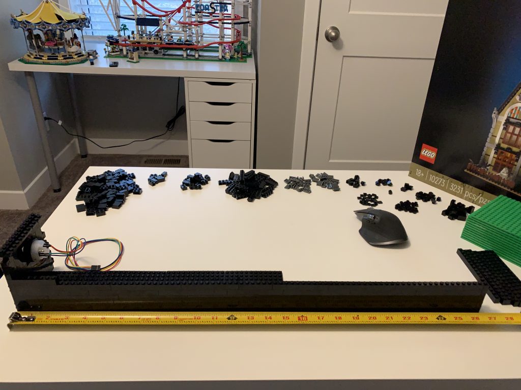 Photo showing the measurement of the front of the control panel at a little over 26".