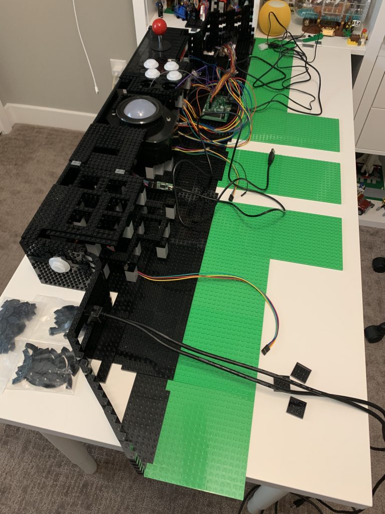 Photo showing green base plates attached to the back of the control panel.