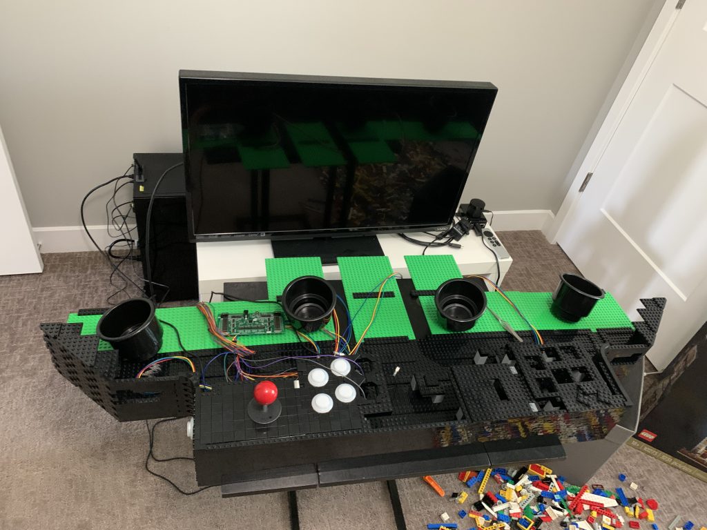 Photo of cup holders sitting on the back of the control panel.