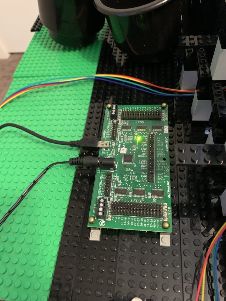 Photo of circuit board mounted using LEGO brick