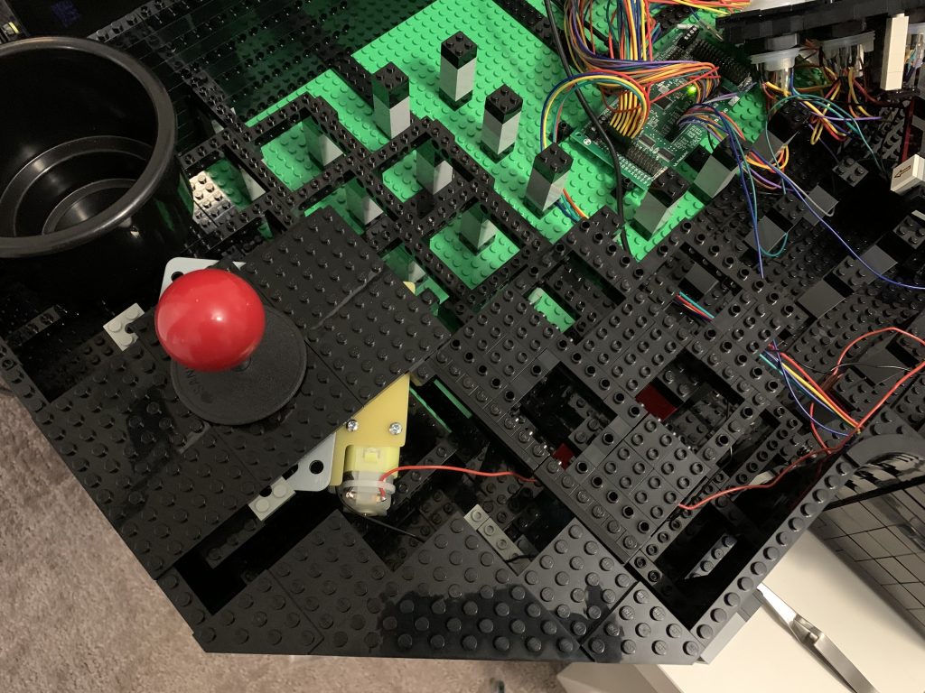 Photo of integrated cage for player 3 buttons