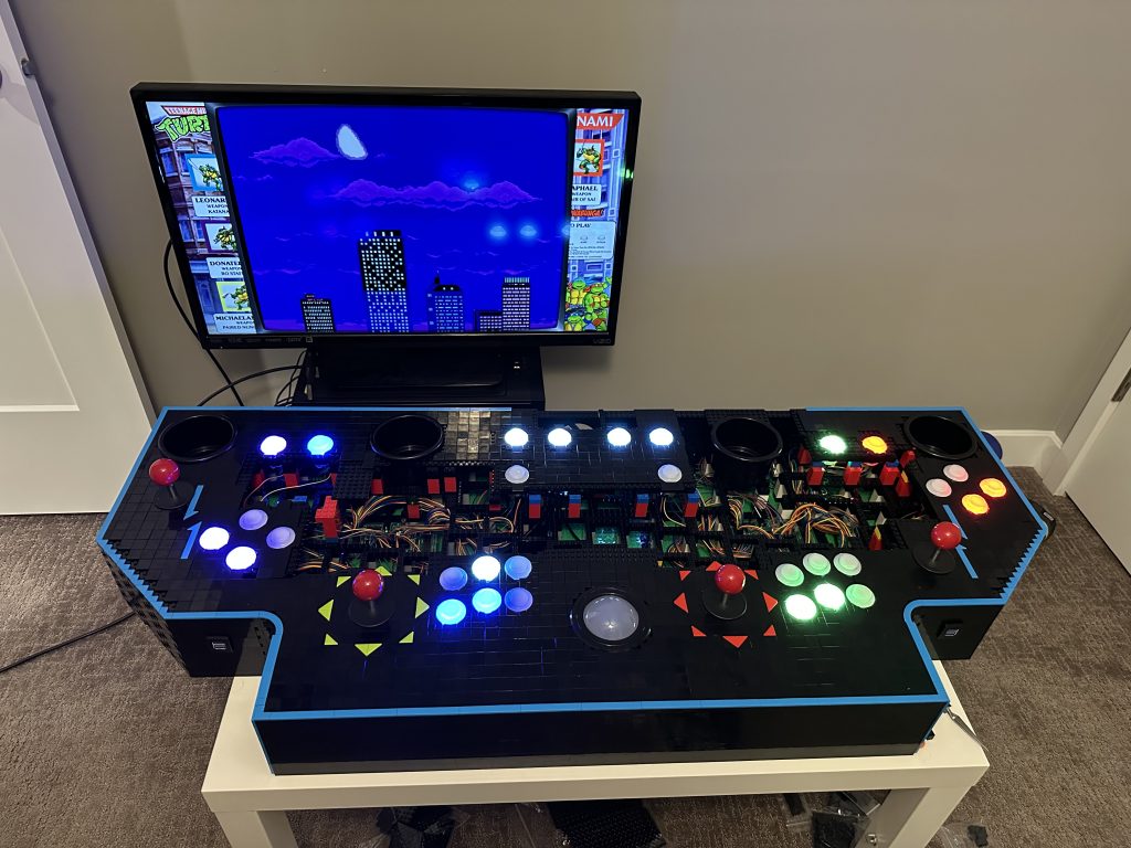 Photo of control panel with all buttons now installed turned on and lit up.