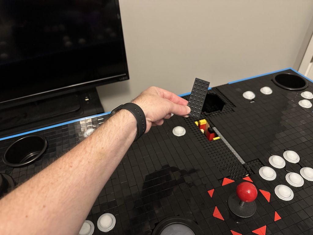 Photo showing me installing the last piece to completely cover up the top.