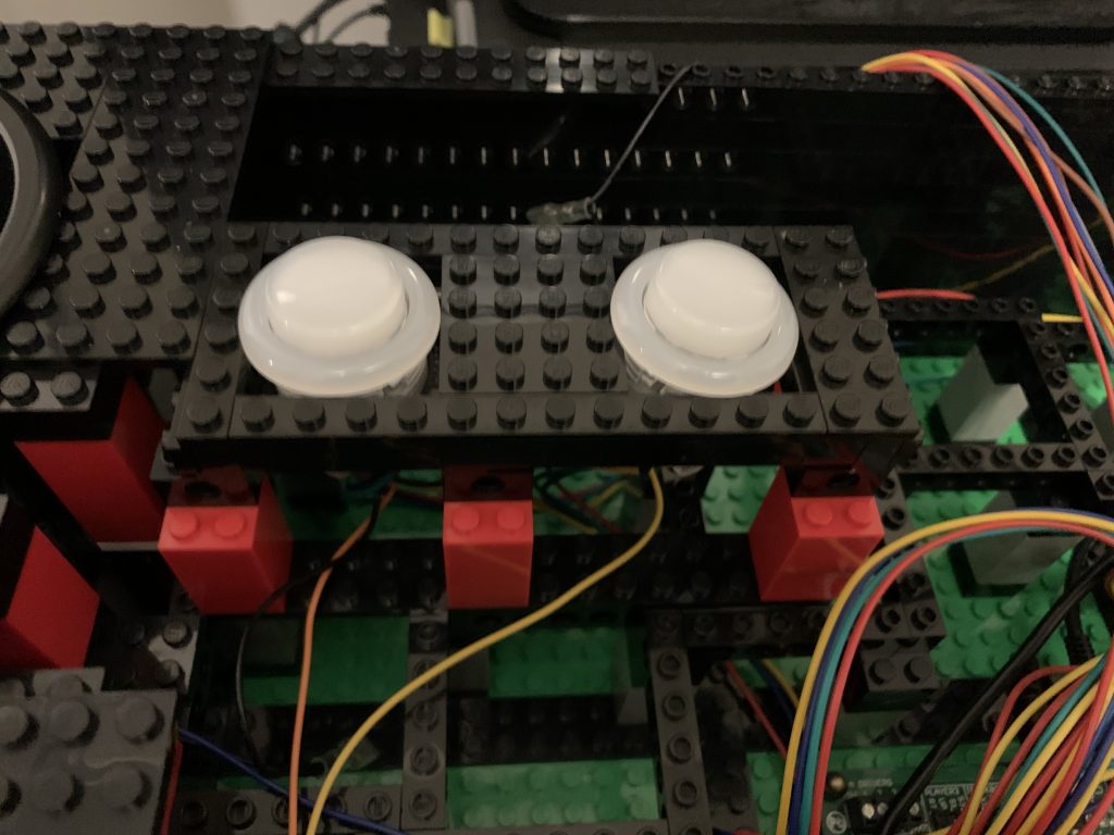 Photo of start buttons installed for players 1 and 3.