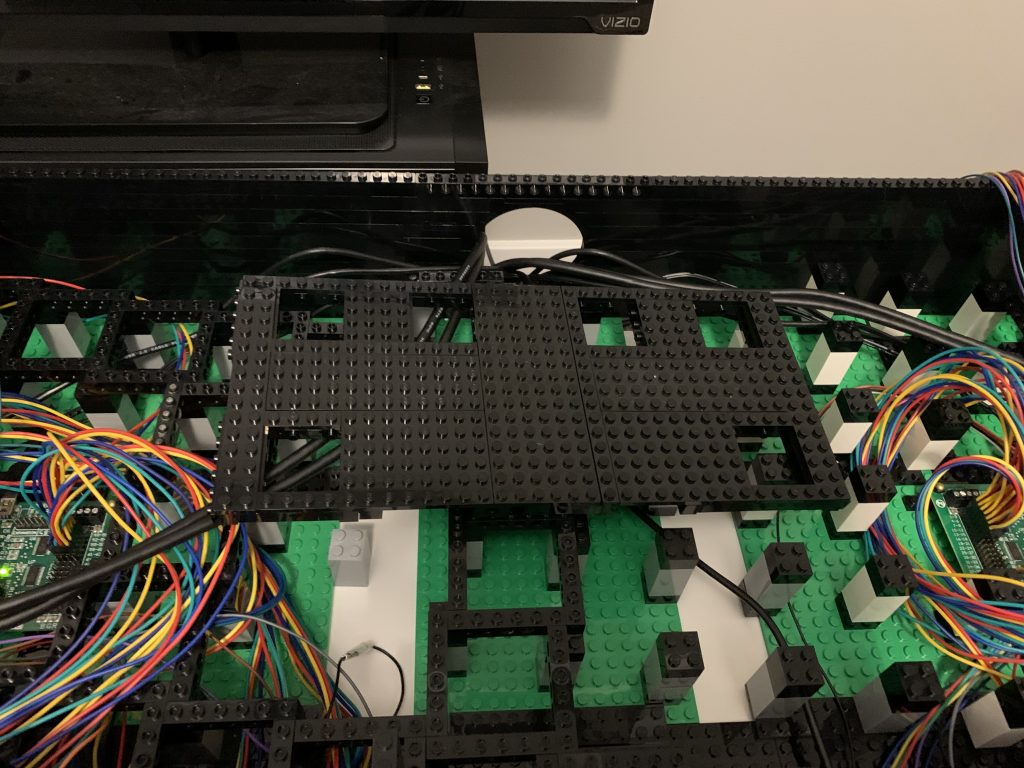 Photo of module for admin buttons laying inside control panel, but not connected nor any buttons installed yet.