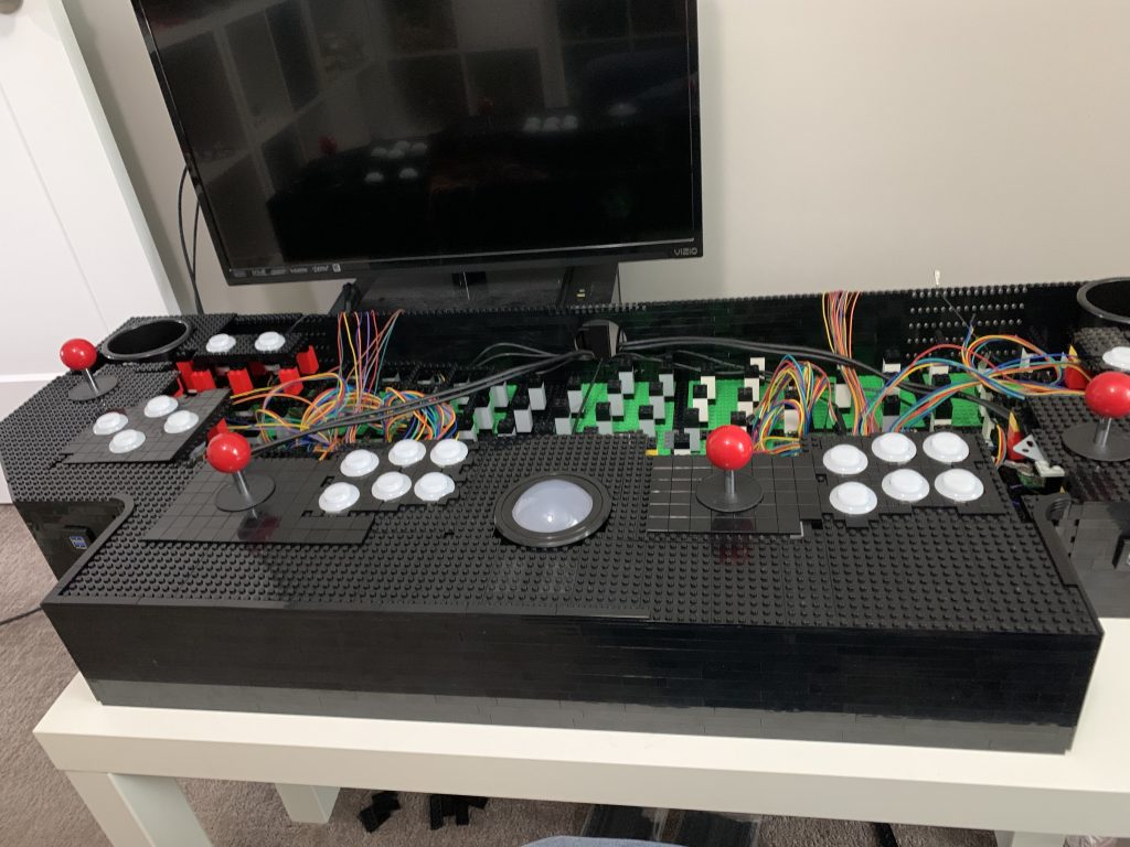 Another photo showing the front of the control panel covered and some tiling laid on top.