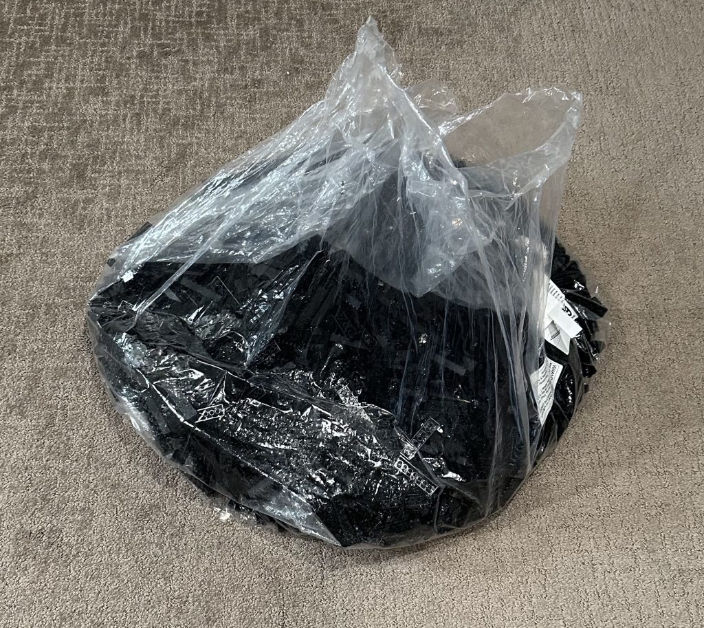 Photo of large bag of 2,000 2x8 bricks shown