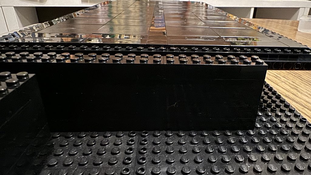 Photo showing bin base sitting on tile from side