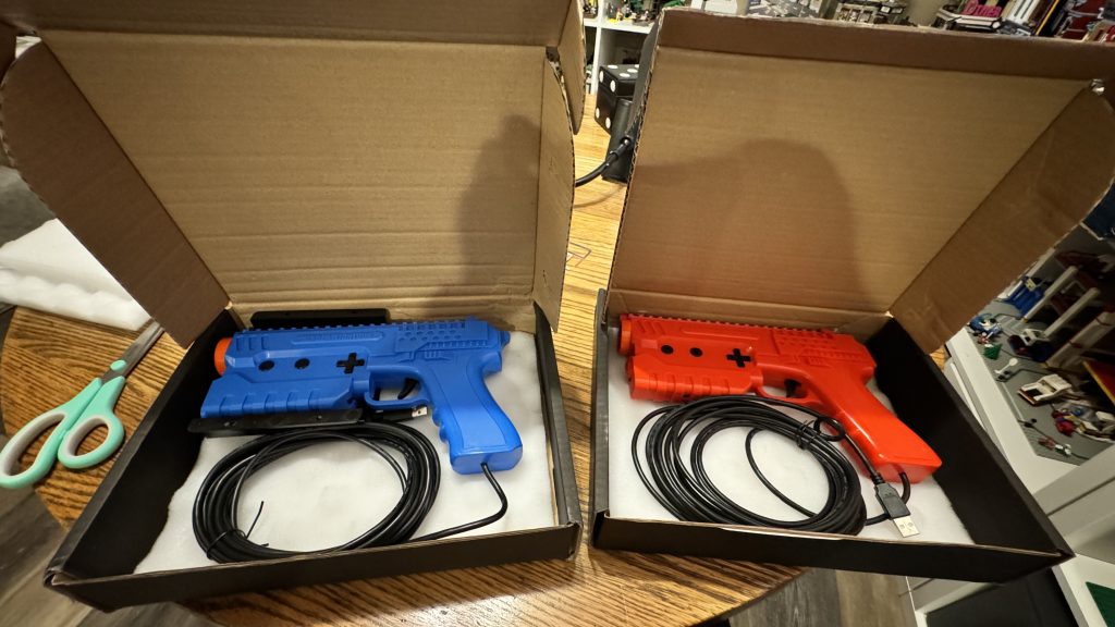 Level up! Photo showing newly added lightguns, one blue and one red.