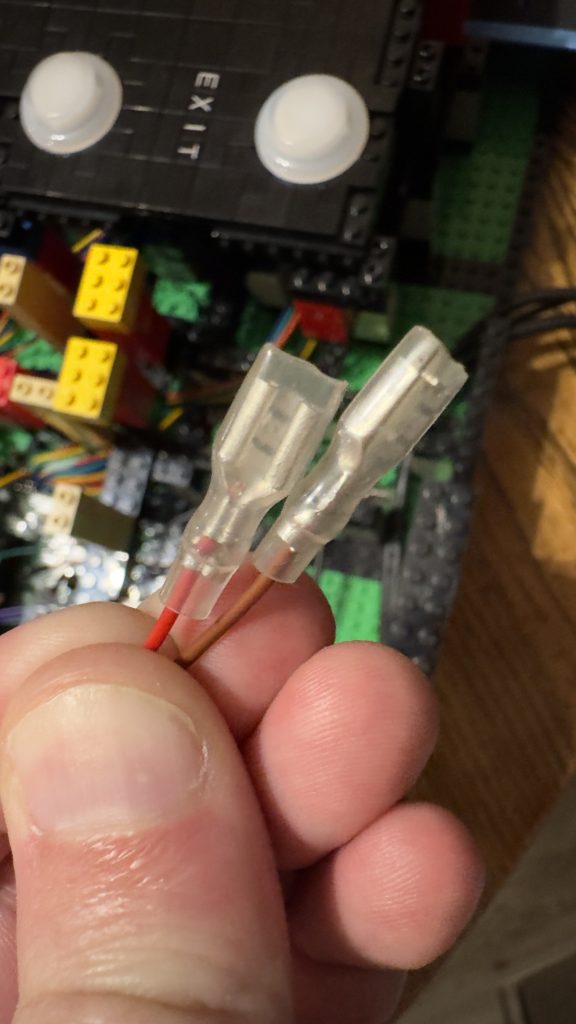 Closeup of two female spade crimp terminals