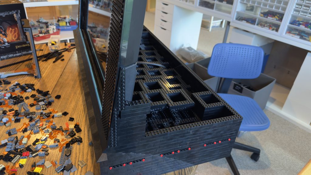 Photo of brick built up the sides of the screen