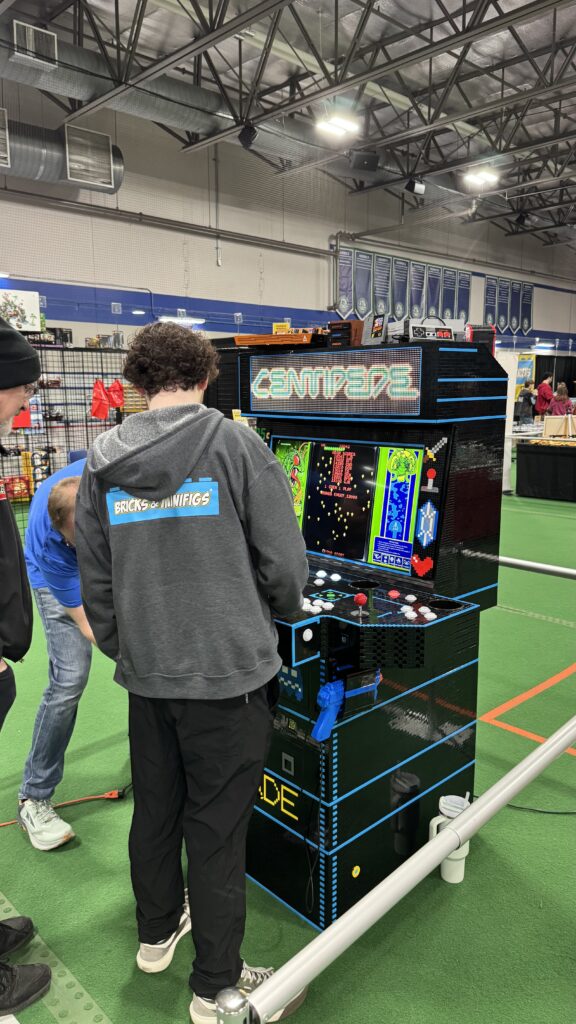 People playing the arcade